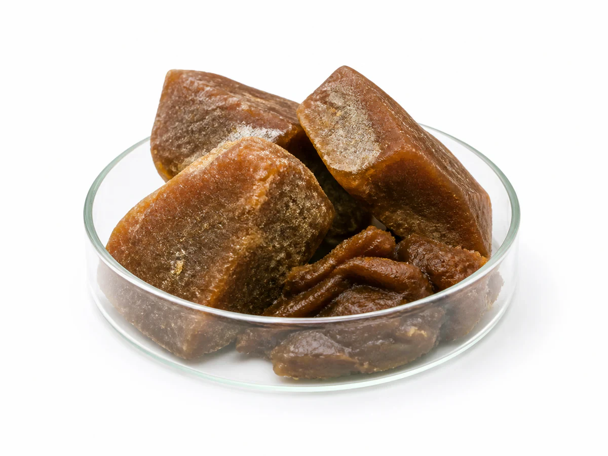 Brown waxy palm kernel fatty acid distillate PKFAD sample